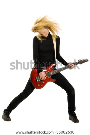 stock photo passionate headbanging woman guitarist playing an electric 