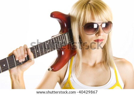 stock photo attractive woman guitarist holding her guitar on shoulder