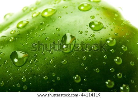 macro picture of a Green bell pepper with water droplets