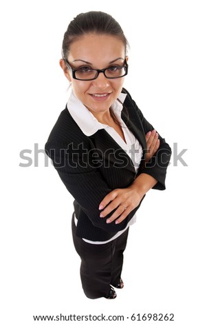 happy business woman with her arms crossed (isolated on white) - wide angle shot