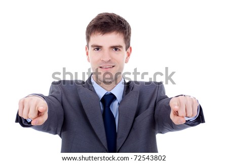 business man in suit and tie pointing the fingers in front of himself