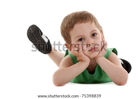 picture of a sad little boy lying on a white background
