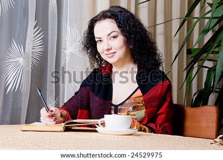 beautiful young woman works in a restaurant