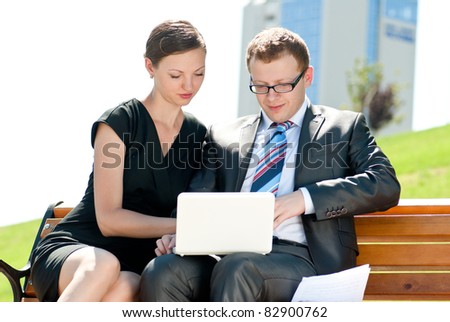 man and woman working