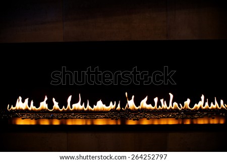 Black gas fireplace reflections