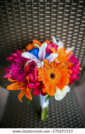Wedding bouquet with Gerbera Daisies, Roses, Asiatic lilies, Stargazer lilies, and Ginger