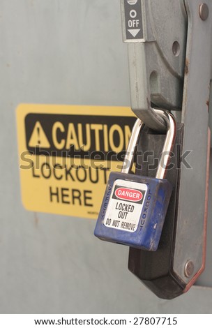 A lock-out tag-out procedure being followed correctly