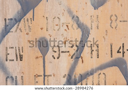 worn wall with paint and lettering