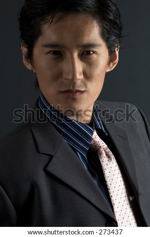 An asian male model in smart casual clothing
