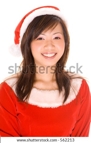stock photo A cute asian girl dressed in a santa costume