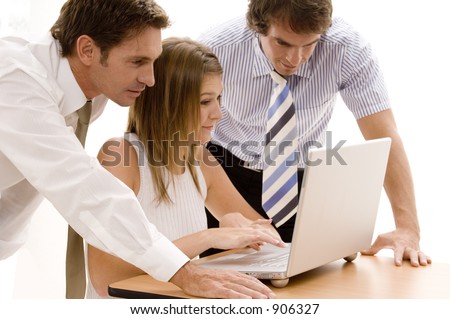 A business team working on a laptop computer