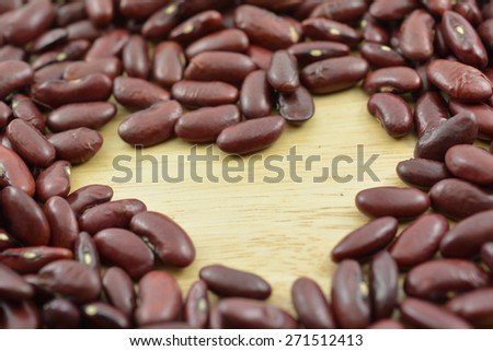The kidney bean or red bean. For health menu and diet food. On wood board.