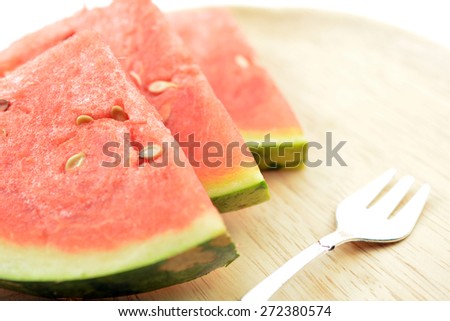 Watermelon cut into triangles. The health benefits of watermelon are mounting up. Research reveals that watermelons may prevent asthma, high blood pressure.