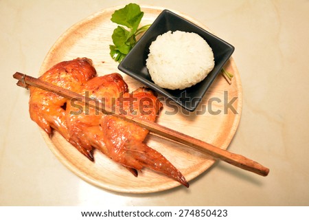 Roast chicken or Kai yang or ping gai is a dish originating from the Lao people of Laos and Isan, but it is now commonly eaten throughout the whole of Thailand.