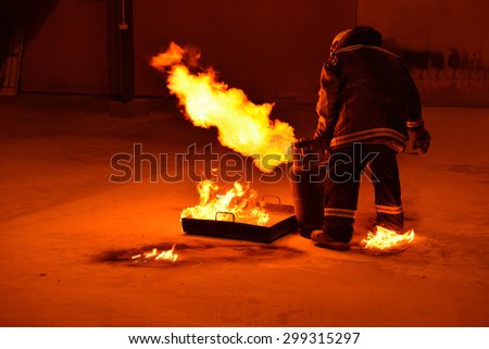 Man in fire show after Firefighters training, Rehearse of firefighters from cooking.