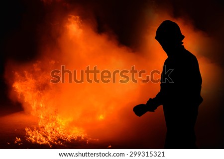 Fireman shadow, Man in fire show after Firefighters training, Rehearse of firefighters from cooking.