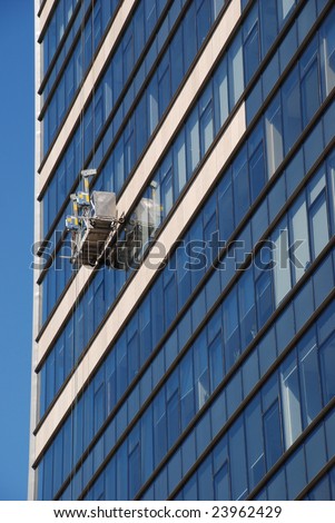 Office building with window cleaning basket