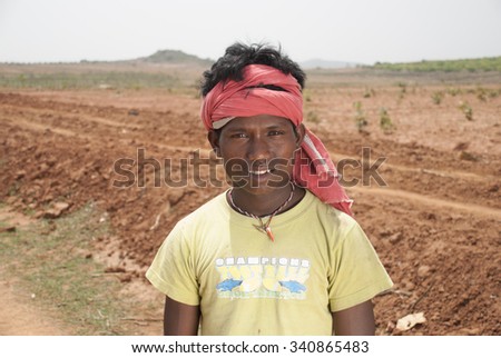 Teeange farmer in rural country - MAY 20th 2015; JEYPORE - INDIA
