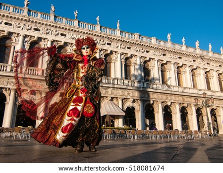 Beautiful mask at St. Mark square during the carnival of Venice.