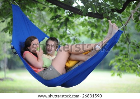 Young couple relaxing in the hammock
