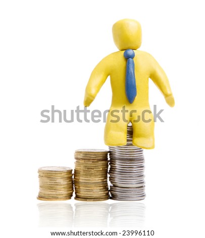 plasticine businessman sit on heaps of gold coins