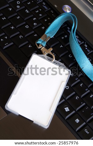 Blank ID card / badge on laptop /notebook