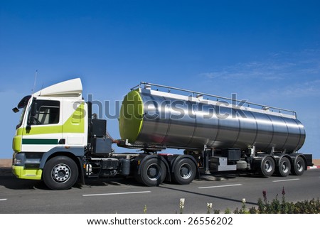 A truck with a big tank for delivering liquid cargoes.