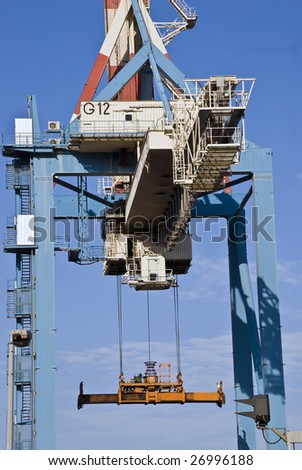 Heavy industrial crane used to load and unload large cargo ships at a port