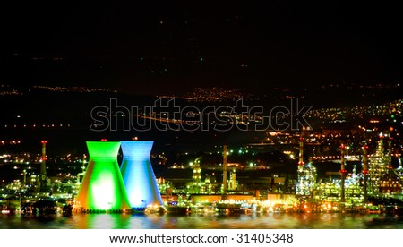 A landscape with the illuminated chemical  factory.