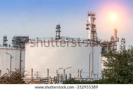 Big Industrial oil tanks in a refinery with treatment pond at industrial plants