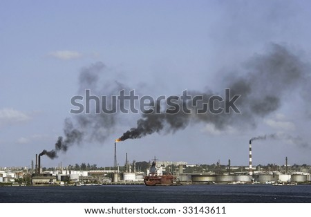Black smoke polluting the environment from an oil refinery. Taken at Cuba.