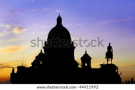Silhouette of Saint Isaac\'s Cathedral or Isaakievskiy Sobor in Saint Petersburg, Russia and Peter the great (far right).