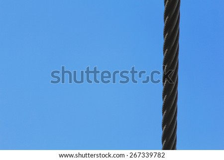Rope against the blue sky . the power. cable. summer day. lift/Rope and blue sky
