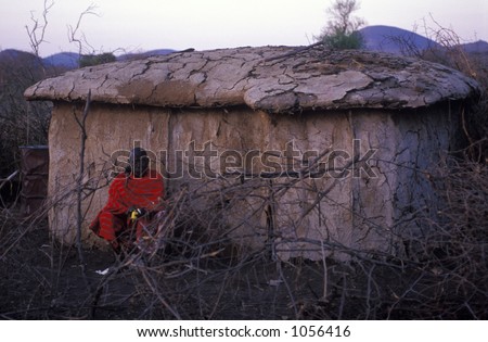 Old man beside mud hut - Maasai village - Chyulu Hills, Kenya