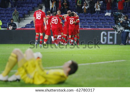 PORTO, PORTUGAL - OCTOBER 8: Portuguese players celebrate their 1st goal in the Euro 2012 Group Stage Qualifying match against Denmark on October 8, 2010 in Porto, Portugal