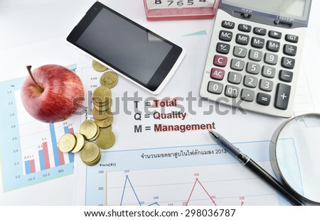 Apple, money,clock, telephone and calculator placed on document., concept for business