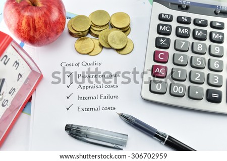 women hand and pen writing element of Cost of Quality on white paper with money and calculator. concept for business.
