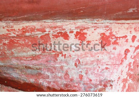 Red painted grunge boat texture detail