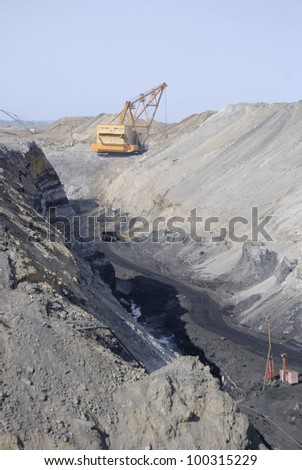 TUGNUI, RUSSIA - APRIL 2: The opening of Tugnuiskaya coal preparation plant.  A mining hauler moves along a coal pit, April 2, 2008 in Tugnui, Buryatia, Russia.
