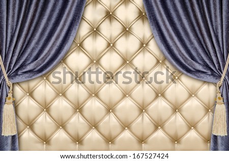golden upholstery, blue curtains with supports and tassels