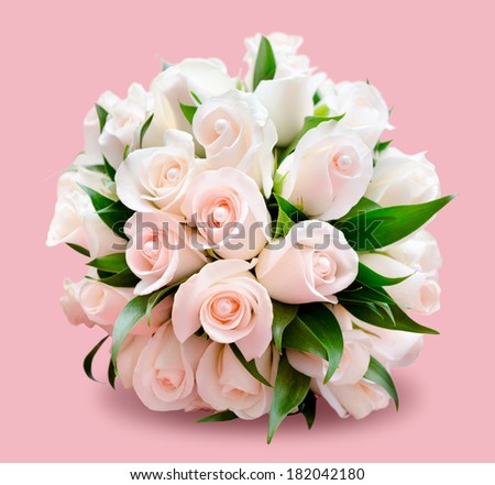 bridal bouquet of delicate light roses, isolated over pink
