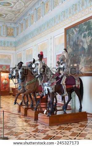 ST. PETERSBURG - JUNE 30, 2011: Knights mannequins on horses at Knights Hall of the Hermitage. It hosts a part of the Hermitage Arsenal collection.