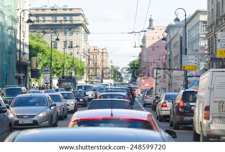 ST.PETERSBURG - JUNE 28, 2011: A lot of cars hardly move in a traffic jam at rush hours in the downtown. During recent 8 years the number of passenger vehicles in Russia has increased by 50 per cent.