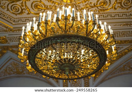 ST PETERSBURG - JUNE 30, 2011: A chandelier in one of halls of the Hermitage Museum. Today the collection of the museum contains about 3 million items.