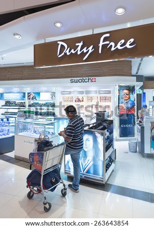 BANGKOK - MARCH 18; 2015: An unidentified man shops at a duty free watches shop at the International Airport Suvarnabhumi which is the sixth busiest airport in Asia.