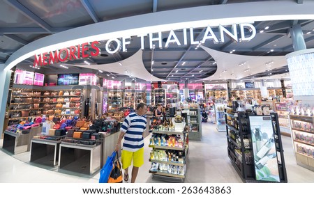 BANGKOK - MARCH 18; 2015: Unidentified people shop at a duty free shop at the International Airport Suvarnabhumi which is the sixth busiest airport in Asia.