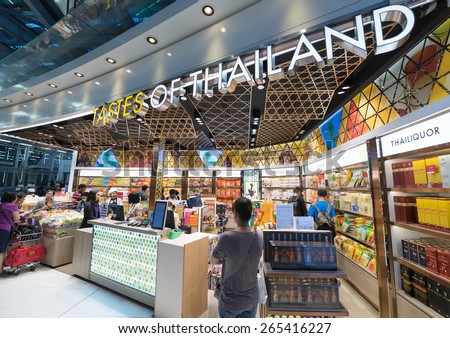BANGKOK - MARCH 18; 2015: Unidentified people shop food at a duty free shop at the International Airport Suvarnabhumi which is the sixth busiest airport in Asia.