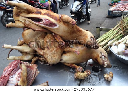 HOCHIMINH - JUNE 5, 2015: Dogs meat is sold at a market. The meat is more expensive than beef, lamb or pork.