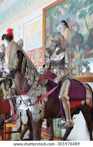 ST. PETERSBURG - JUNE 30, 2011: One of knights mannequins on horses at Knights Hall of the Hermitage. It hosts a part of the Hermitage Arsenal collection.
