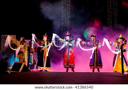 ULAN-UDE, RUSSIA - OCTOBER 29: Asian models demonstrate a dresses in ethnic style at the international asian fashion festival on October, 29, 2009 in Ulan-Ude, Buryatia, Russia.